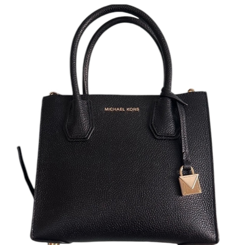 Michael Kors pebbled leather mini messenger bag. In black - Picture 1 of 4